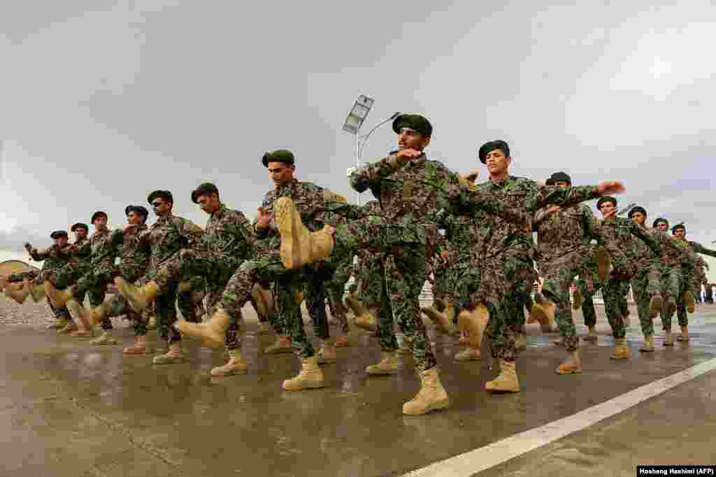 Afghan National Army soldiers marching during a training exercise for a graduation ceremony at a training center in Herat Province. (AFP/Hoshang Hashimi)