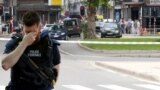 Un polițist la locul atacului de la Liege