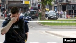Belgijski policajac na mjestu napada u Liježu, 29. maj 2018. 
