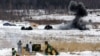 Exerciții militare la Centrului Internațional pentru Menținerea Păcii și Securității de la Yavoriv. Un militar ucrainean distruge un buncăr cu armament furnizat Ucrainei de Statele Unite, 4 februarie 2022.