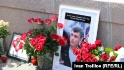 A small memorial is placed to Boris Nemtsov on the Bolshoi Moskvoretsky bridge in Moscow where he was killed in February.