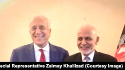 Afghan President Ashraf Ghani (R) also met Zalmay Khalilzad in Munich on February 16.