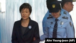 Түштүк Кореянын камакка алынган президенти Пак Кын Хе.