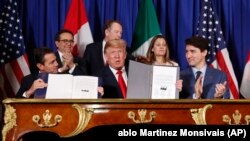 Претседателите на Мексико и на САД, Енрике Пења Нијето и Доналд Трамп, и канадскиот премиер Џастин Трудо го потпишаа новиот трговски договор