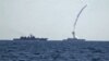 A missile is fired from a Russian warship in the Mediterranean Sea on June 22.