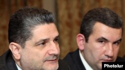 Armenia -- Prime Minister Tigran Sarkisian (L) and Artak Shaboyan, head of the State Commission on the Protection of Economic Competition (SCPEC), at an international seminar in Yerevan, 21Mar2011.