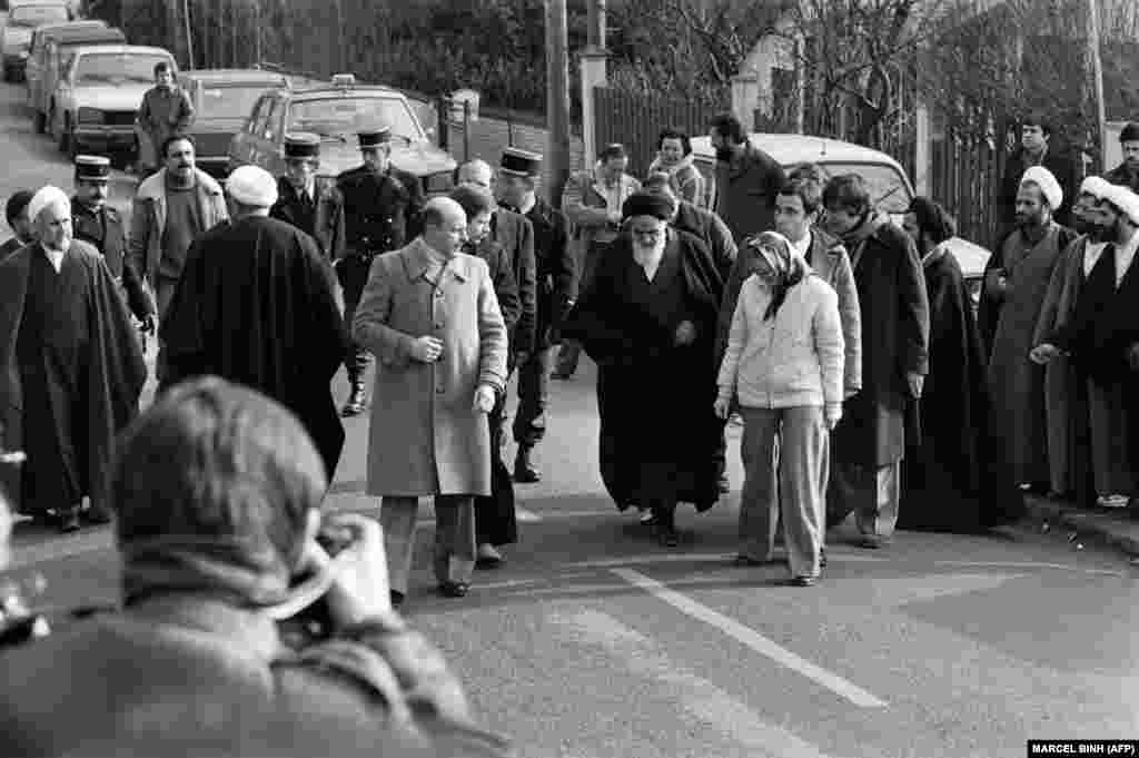 Ayatollah Ruhollah Khomeini leaves his villa in Neauphle-le-Chateau, near Paris, on January 31, 1979, to board an Air France jet bound for Tehran.