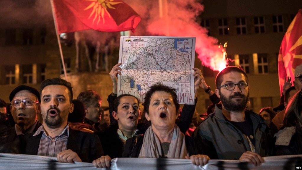 Protesters in the Macedonian capital Skopje protest against a political agreement that would ensure the wider use of the Albanian language in the ethnically divided state.