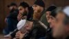 Crimean Tatars listen to a sermon in the Khan Chair mosque in Bakhchisaray, near Simferopol.