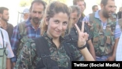 A Kurdish female fighter named 'Rehana' has become an iconic figure in the fight against Islamic State ever since this picture was widely circulated on social media. 