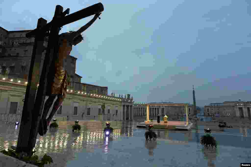 Pope Francis delivers an extraordinary Urbi et Orbi blessing -- normally given only at Christmas and Easter -- from an empty St. Peter's Square as a response to the global coronavirus pandemic, at the Vatican on March 27. (Reuters/Vatican Media)