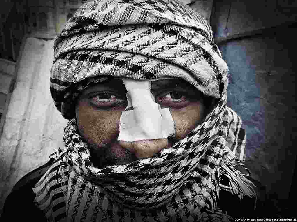 Участник &laquo;арабской весны&raquo; в Египте на площади Тахрир, Каир.&nbsp;Февраль, 2011&nbsp;