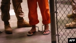 "The main unresolved problem is the odious prison in Guantanamo Bay," the Russian report says.