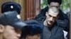 Russian artist Pyotr Pavlensky appears in Moscow's Tagansky district court in February charged with setting fire to the entrance door of the FSB building at Lubyanka Square in Moscow.