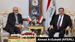 لقاء في بغداد بين وزير خارجية العراق هوشيار زيباري وايران محمد جواد ظريف 