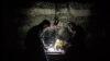 Men play chess during a power cut in Yalta, Crimea, in November.