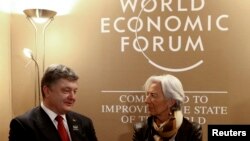 Директор-распорядитель МВФ Кристин Лагард и президент Украины Петр Порошенко
