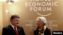 Директор-розпорядник МВФ Крістін Лаґард і президент України Петро Порошенко 