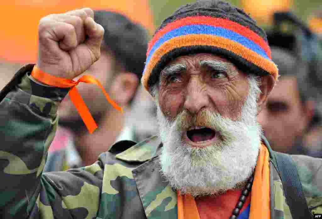 A supporter of Armenian opposition leader Raffi Hovannisian shouts during an inauguration-day rally against President Serzh Sarkisian's victory in February elections in Yerevan. (AFP/Karen Minasyan)