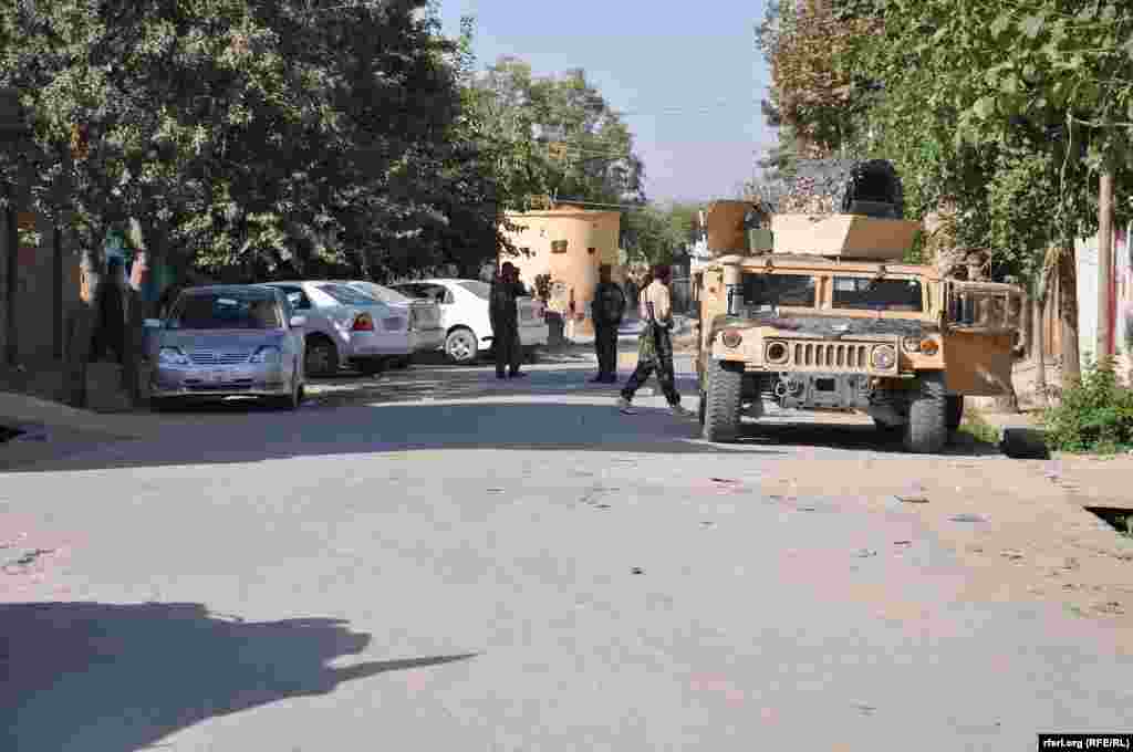 Government forces are out in the streets of Kunduz to show their control over the city on October 5.