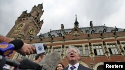 Kosovo Foreign Minister Skender Hyseni outside the ICJ building in The Hague on July 22