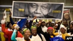 South Africans arriving at the Johannesburg stadium before the memorial service for Nelson Mandela on December 10.