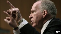 John Brennan testifies before the Senate Intelligence Committee in Washington on February 7.