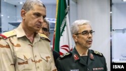 Chief of Staff for the Iranian Armed Forces Major General Mohammad Baqeri (R) and his Iraqi counterpart Major General Othman al-Ghanmi (L) meet in Tehran on September 27, 2017. (Photo by ISNA)