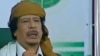 Лидер ливийской джамахирии Муаммар Каддафи. Триполи, 2 марта 2011 года.