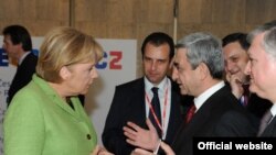 Armenia - Serzh Sarkisian, President of Armenia, and Angela Merkel, Chancellor of Germany, at the EU Eastern Partnership Summit, Prague,07May2009