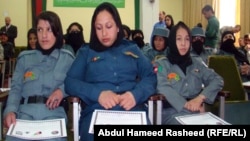 Afghan policewomen receive certificates for completing a counternarcotics training course in Kabul under the old administration before the Taliban takeover. (file photo)