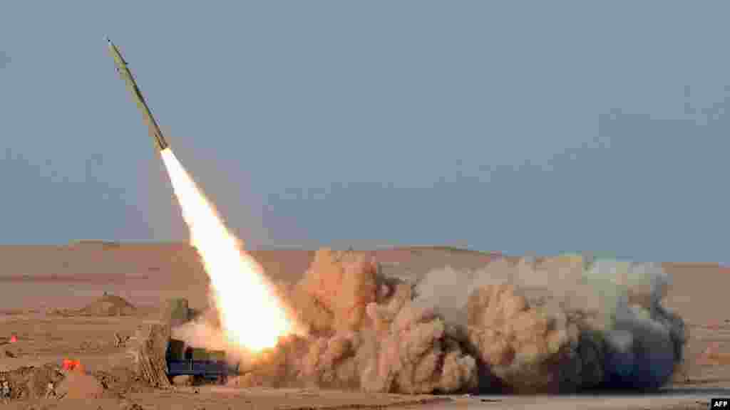 A short-range missile is launched during the second day of military exercises, code-named Great Prophet 7, for Revolutionary Guards in Iran's Kavir Desert on July 3. (AFP/ISNA/Arash Khamoushi)