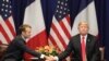 French President Emmanuel Macron (L) shakes hands with U.S. President Donald Trump at the start of a bilateral meeting in New York, September 24, 2018