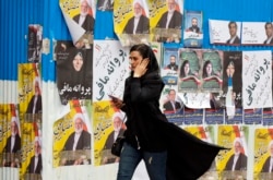 Уличная реклама участников избирательной кампании в Тегеране. Февраль 2020 года