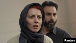 Leila Hatami (left) and Peyman Moadi in a scene from the Oscar-nominated Iranian film "A Separation."