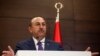 Turkish Foreign Minister Mevlut Cavusoglu gives a press conference following a meeting of the Russian-Turkish joint strategic planning group in Antalya, March 29, 2019
