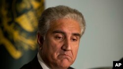 File Photo:Pakistan's Foreign Minister Shah Mahmood Qureshi gestures during a briefing about the visit of U.S. Secretary of State Mike Pompeo, at foreign ministry in Islamabad, Pakistan, Wednesday, Sept. 5, 2018. Pakistan's newly-elected Prime Minister Imran Khan me