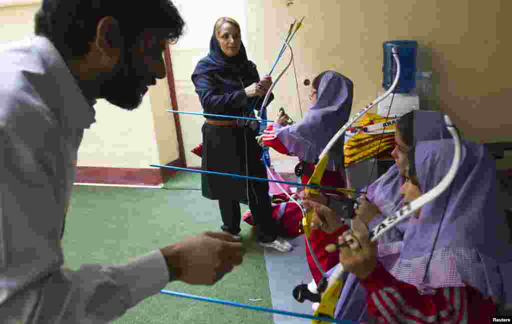 Students learn archery at the Pishtaz School in Tehran, a preschool for gifted children.
