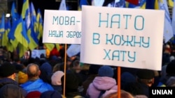 Під час акції у столиці України з вимогою до влади не йти на поступку Кремлю. Київ, 8 грудня 2019 року 