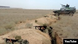 An undated photo of Azerbaijani soldiers taking part in military exercises.