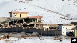 Afghan security forces inspect the site of a Taliban attack in Maidan Shar, capital of Maidan Wardak province, east of Kabul, January 21, 2019. File photo