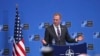 Acting U.S. Defence Secretary Patrick Shanahan talks to journalists during a press conference at the second day of a NATO defense ministers meeting at NATO headquarters in Brussels on February 14.