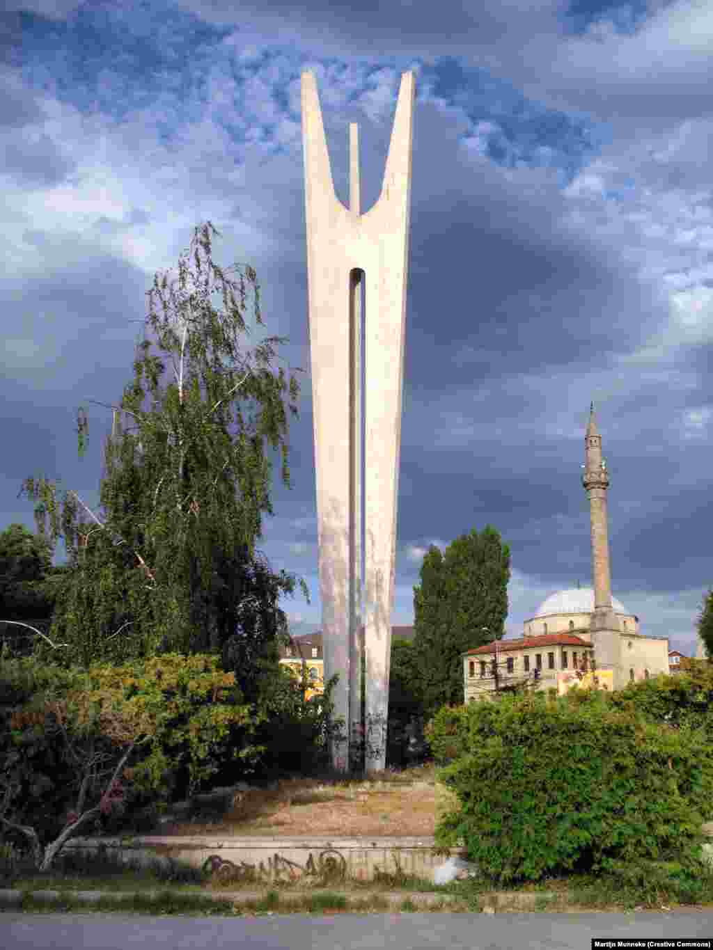 Monument to Brotherhood and Unity in Pristina, Kosovo The three columns are supposed to represent the three main ethnicities who lived in Pristina during the Yugoslav period: Serbs, Albanians, and Montenegrins.