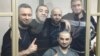 The five defendants (seen here in a courtroom in April) were arrested in October 2016 after Russia-controlled authorities in Ukraine's Crimea searched their homes.