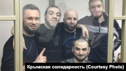 The five defendants (seen here in a courtroom in April) were arrested in October 2016 after Russia-controlled authorities in Ukraine's Crimea searched their homes.