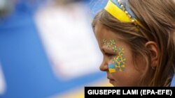 ITALY – Girl at rallies in support of Ukraine against the background of a large-scale Russian invasion. Rome, Italy, March 27, 2022