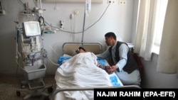 AFGHANISTAN --An Afghan Local Police militia who was injured in Taliban attack in Qala-e-Zal district of Kunduz province receives medical treatment at a hospital in Mazar-e-Sharif, Afghanistan, 09 June 2018