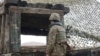 Armenia - An Armenian soldiers guards the border with Azerbaijan's Nakhichevan exclave, 27Nov2013.