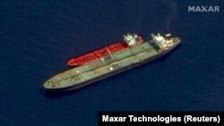 Two Iranian-flagged tankers, the Adrian Darya 1 and the Jasmine, are pictured north of Tartus, Syria, in this satellite image handout released on October 3 by Maxar Technologies.
