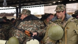 Armenia -- Volunteers are handed uniforms, weapons and ammunition at a military base in Yerevan before their departure to Nagorno-Karabakh, April 3, 2016.